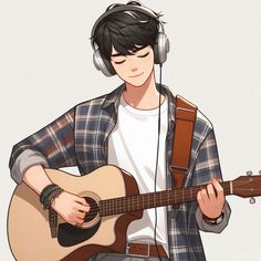 a boy with headphones playing an acoustic guitar