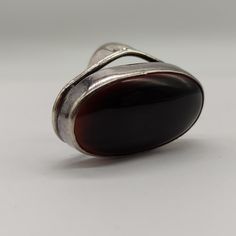 Large agate ring, the stone is a very dark brown, appearing almost black. Face of ring measures approx. 3.3cm . Band is approx. 4mm wide and stamped SILVER. In very good condition with light surface wear and some patina to the silver.  UK Size K/L - US Size 5.5. Your ring will be sent gift wrapped. Oval Brown Agate Rings, Brown Oval Agate Rings, Unique Brown Rings For Formal Occasions, Brown Agate, Agate Ring, Send Gift, Vintage Brown, Rings Statement, Favorite Jewelry