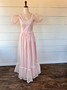 Vintage 70s pink Swiss dot full length dress 🌸☀️ Style is very Gunne Sax. No tag. Full gorgeous skirt.  Measurements are Pit to pit 13 1/2 Waist 12 Length 55 Pink Floor-length Maxi Dress For Daywear, Pink Fitted Full-length Maxi Dress, Fitted Pink Full-length Maxi Dress, Fitted Full Length Pink Maxi Dress, Pink Fitted Prairie Dress For Spring, Feminine Pink Cotton Maxi Dress, Pink Full Length Maxi Dress For Spring, Vintage Pink Maxi Dress For Daywear, Pink Vintage Maxi Length Dress