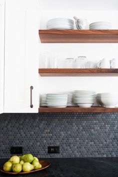 the kitchen is clean and ready to be used for dinner or desserts on the counter