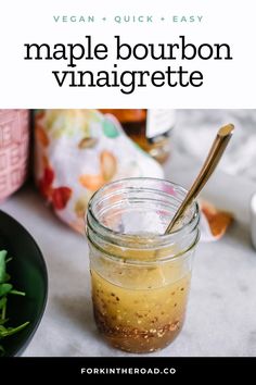 a mason jar filled with maple bourbon vinaigrette