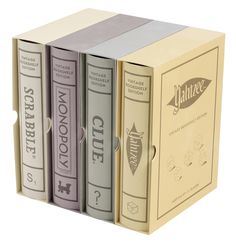 three books are stacked on top of each other in the shape of a book box