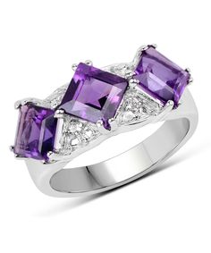 ITEM INFORMATION Product Type Ring Condition New Gender Women's Total Item Weight 5.64 grams (approx.) Total Carat Weight 3.09ctw (approx.) Product Dimensions W 8.38mm x H 5.33mm MATERIAL INFORMATION Material Type(s) Rhodium Plated 925 Sterling Silver PRIMARY GEMSTONE INFO Gemstone Amethyst / 3 pcs Composition Natural Total Carat Weight Approx. 3.00ct Shape and Cut Square Measurements L 6.00mm x W6.00mm Color Grade Purple Setting Type Prong SECONDARY GEMSTONE INFO Gemstone Topaz / 4 pcs Composit Ring 3 Stone, Rhodium Jewelry, February Birthstone Ring, Purple Amethyst Ring, Purple Jewelry, Right Hand Rings, Square Rings, Amethyst Jewelry, February Birth Stone