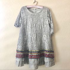 Lovely Ash Gray Swing Dress With A Layered Bottom, Colored Detailing And A Spring Motif. Style Is Really Similar To That Of Free People, Anthropologie, Doen And Other Bohemian Brands. New Without Tags! Bought At A Local Boutique But Sadly Never Worn Because It Wasn’t The Right Size. This Fits Like A Medium/Large And Looks Oversized On Xs/S. Gray Short Sleeve Mini Dress For Party, Fitted Gray Dress For Festive Occasions, Silver Short Sleeve Dress For Spring, Silver Dresses For Spring Festivities, Dresses Boutique, White Linen Pants, Ash Gray, Tie Dye Maxi Dresses, Chevron Dress