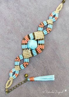 a beaded bracelet with beads and charms