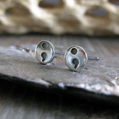 Show your support for Mental Health Awareness with these semi-colon stud earrings made of sterling silver. Crafted with love and care, these meaningful and stylish earrings are a subtle way to bring needed attention to Mental Health Awareness.The Details∞ Artisan handmade jewelry∞ Tiny semi colons (approx 5mm)∞ Choose from sterling silver with a polished or brushed finish∞ Earring backs included ∞ Made to order ∞ Gift box included∞ Made in the USA Semi Colon, Artisan Jewelry Handmade, Stylish Earrings, Stylish Earring, Health Awareness, Mental Health Awareness, Handmade Artisan, Earring Backs, With Love