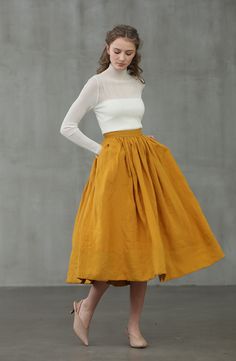 "Party, business, school, where will you want to wear this skirt? Clean,crisp and polished: YELLOW Skirt is a timeless wardrobe staple. The designer team want to find you something perfect at the beginning of the new year. :) The linennaive skirt collection celebrates classic dressing with a modern twist, as showcased by this yellow and ashed lilac pleated midi skirt. Featuring a high rise, a wide border, deep pockets, distressed effects and a mid-length. Waistline. Sometimes we feel something w Spring A-line Maxi Skirt With Pleated Waist, Spring A-line Maxi Skirt With Pleated Hem, Spring Full Maxi Skirt With Pleated Waist, Spring Solid Color Knee-length Culottes, Spring Knee-length Skirt With Pleated Hem, Knee-length Skirt With Pleated Hem For Spring, Spring Pleated Wide-leg Skirt, Spring Wide-leg Pleated Skirt, Spring Wide Leg Pleated Skirt