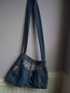 "80's shoulder bag made from a pair of denim jeans, with playing card detail at all pocketed areas. In total their are 6 pockets 2 in the back and 4 in the front of the bag. There is a 12 inch zippered closure at the top of the purse, and a strap that measures 44 1/2\" long, making it suitable to cross over the body, Measurement at the bottom of the bag is 17\", at the top 12 1/2\" , it is 13\" long on each side, center length is 11\" Feel free to convo with me for any further questions. Thank y Vintage Upcycled Denim Bag, Vintage Denim Shoulder Bag For Travel, Retro Blue Bags With Pockets, Vintage Denim Bag With Pockets, Vintage Denim Shoulder Bag, Vintage Denim Tote Shoulder Bag, Vintage Denim Blue Shoulder Bag, Vintage Blue Denim Shoulder Bag, Salty Dog