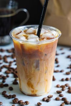 iced coffee with ice and chocolate chips on the table