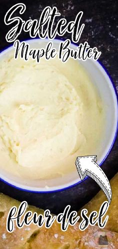 a bowl filled with mashed potatoes sitting on top of a table