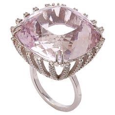 Sparkling Pink Kunzite & White Diamonds Ring features Custom Cushion Cut Faceted Kunzite that radiates prismatic hues of lavender and pink, presented on stunning diamond encrusted prongs with a supporting frame of full white diamond pave lines and shank set in 18k White Gold. 18k White Gold 17.96g, Kunzite, White Diamonds 1.51cts From Karma El Khalil's Linea Collection \ Kunzite Ring, Pink Kunzite, Ingredients List, White Diamond Ring, Diamonds Ring, Diamond Cocktail Rings, Custom Cushions, White Diamonds, Cocktail Ring