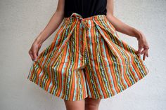 "High waist summer skorts, 60s 70s bohemian shorts, striped hippie shorts, festival wear, M 100% cotton high waist summer skorts. Two side pockets and one more on the bottom. Thick and strong fabric. Size: seems like women's (M) PLEASE CHECK ALL MEASUREMENTS BELLOW: Length: 50cm / 20\" Waist: 70 cm / 28\" Hips: 170 cm / 67\" Inseam: 16 cm / 6\" Fabric: 100% cotton Brand: Mexx Condition: excellent * Wash at temperature not higher than 30oC / 86oF KEEP IN MIND: Photo might be slightly different fr Retro High-waisted Shorts For Summer, Retro Cotton Shorts With Elastic Waistband, Retro Shorts For Spring, Spring Hippie Shorts, Retro Summer Shorts, Retro Striped Bottoms For Summer, Vintage Striped Short Bottoms, Retro Striped Summer Bottoms, Retro High-waisted Beach Shorts