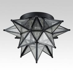 a ceiling light that is shaped like a star