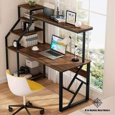 a computer desk sitting on top of a wooden floor