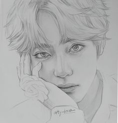 a pencil drawing of a boy with his hand on his face