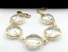 "Vintage gold tone and crystal link bracelet, In very good condition. It's 7' 12/ long Extend 2\" long. 7/8\" wide. Weighs 1 Oz. Thanks." Gold Faceted Crystal Bracelet, Gold Crystal Bracelet With Faceted Details, Gold Crystal Bracelet Costume Jewelry, Gold Crystal Costume Bracelet, Adjustable Gold Crystal Bracelet Costume Jewelry, Swarovski Brooch, Sterling Silver Marcasite, Moon Stone, Chain Link Bracelet