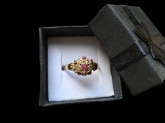 Very pretty Victorian gold ruby and split pearl  cluster ring Lovely colour rubies No hallmarks  Wear consistent with age and use  Ring size US 7 3/4 UK O 1/2 EU 55 Weight 2 g Can be resized Size of the ring head 9.4 mm x 9.1 mm Gold Cluster Pearl Ring Gift, Gold Cluster Ruby Ring For Wedding, Gold Cluster Ring With Birthstone, Gold Birthstone Cluster Ring, Heirloom Cluster Ring Gift, Gold Cluster Ruby Ring Hallmarked, Gold Cluster Ruby Ring, Hallmarked, Gold Ruby Cluster Ring, Gold Cluster Ruby Ring For Promise