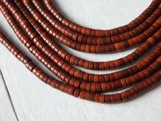 "One strand of irregular howlite heishi beads in a gorgeous range of warm browns. They measure approximately 4x2mm and have a 1mm hole. Smooth finish, great quality! Strand measures 40cm (15 3/4\"). Many other howlite heishi beads available! They can be seen here: https://www.etsy.com/hk-en/shop/TintinBeads?ref=seller-platform-mcnav&search_query=howlite+heishi BH/16016" Mens Designer Jewelry, Warm Browns, Heishi Beads, Brass Pendant, Men's Jewelry, Jewelry Designs, Hong Kong, Mens Jewelry, Beaded Necklace