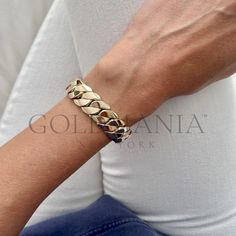 "All Our Bracelets Are Made Of REAL 14K GOLD   Stand out with this unique 14mm thick Miami Cuban Bracelet featuring a box lock clasp   14K Yellow Gold Miami Cuban Chain Bracelet, 14mm Thick, 7.5\" Inch, Real Gold Bracelet, Women  Shop our 14K Bracelets https://www.etsy.com/shop/GOLDMANIA?ref=seller-platform-mcnav§ion_id=26925987  Shop On Sale items https://www.etsy.com/shop/GOLDMANIA?ref=seller-platform-mcnav§ion_id=1  Metal: 14K Yellow Gold    Width: 14 MM  Length: 7.5 IN  Closure: Box Weight: Luxury Bracelets With Chunky Cuban Link Chain, Luxury Cuban Link Bracelet With Chunky Chain, Luxury Thick Band Bracelets For Formal Occasions, Luxury Gold Bracelet With Chunky Chain, Luxury Gold Bracelet With Chunky Chain For Formal Occasions, Luxury Formal Gold Bracelet With Chunky Chain, Gold Bracelet Women, Real Gold Bracelet, Cuban Chain Bracelet