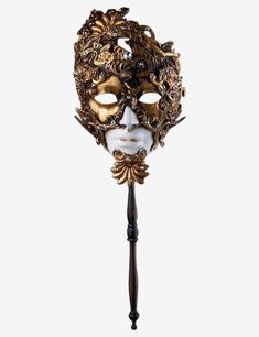 Gold Gala with Stick authentic venetian mask in paper mache with a unique baroque style. This item is strictly handcrafted in Venice, Italy by the famous artists of the city according to the carnival tradition. Each item comes with certificate of authenticity. Mask Dimensions: Height: 53 cmWidth: 18 cmDepth: 10 cm Traditional Baroque Masquerade Mask For Carnival, Artistic Baroque Party Masks, Masquerade Mask With Stick, Venetian Baroque Masks For Carnival, Luxury Baroque Carnival Masks, Venetian Baroque Masks For Theater, Ball Masks, Crown Aesthetic, Neo Baroque