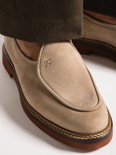 LEX Beige Nubuck leather is the perfect modern basic for spring summer. These luxurious loafers testify to Jacques Solovière Paris's commitment to making elegant and comfortable footwear that goes the distance, in effortlessly rakish fashion. These loafers are made from Italian leather with a kid leather lining, then shaped to a round-toe profile that's set on a lightweight micro sole with a stitched welt.-Beige Nubuck leather-Lightweight micro sole with double stitched welt-Cemented constructio Luxury Timeless Men's Slip-on Shoes, Beige Leather Loafers With Stitched Sole, Luxury Mens Fashion, Beige Brogue Detailing Slip-on Loafers, Beige Stitched Sole Slip-on Loafers, Shoes Details, Luxury Gentleman's Slip-on Loafers, Dirt Stains, Comfortable Footwear