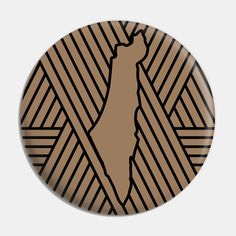 a brown and black button with the shape of a camel on it's side