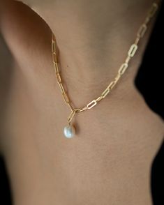 "All metal components are 14K gold filled with a Fresh water pearl. Simple yet unique and stand out! Perfect layering necklace, and Beautiful on its own, layer with your other favorite necklaces :) ■ EX> Small Small 16\" Medium 20\" --------------------------------------- SHIPPING UPGRADES You can find shipping upgrades options in the drop bar menu when you check out. + Within the U.S Regular First-class : 2-6 business days Priority : 2-3days Express : 1-2 days + International International P Statement Necklace Gold, Pearl Statement Necklace, Real Gold Jewelry, Gold Statement Necklace, Gold Pearl Necklace, Bar Menu, India Jewelry, Fresh Water Pearl, Wedding Jewellery Necklace