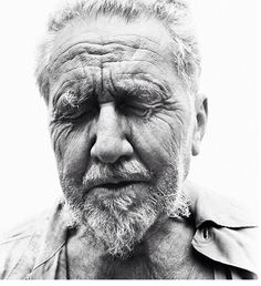 black and white photograph of an old man with wrinkles