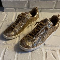 Gold And Sparkly. Never Worn- Like New Condition Spring Glitter Lace-up Sneakers, Gold Sneakers With Speckled Midsole And Round Toe, Gold Low-top Sneakers For Spring, Gold Slip-on Sneakers For Spring, Trendy Gold Sneakers For Party, Trendy Gold Party Sneakers, Gold Round Toe Sneakers For Party, Gold Glitter Lace-up Sneakers, Casual Gold Glitter Sneakers