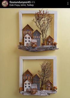 two frames are decorated with houses and trees