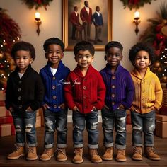 five children standing in front of a christmas tree