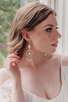 My fabulous, unique boho bridal earrings 'lotus' are designed to be a real statement piece. Handmade with luxury mother of pearl ovals, Natural shell pearl drops and shimmering Preciosa pearls.Perfect for an ethereal boho wedding or a beautiful bold bride.Earrings measure -  Length 8.5cm (3.6") The earrings are available in gold, silver or rose gold.The earring hooks are available in gold or silver plated, rose gold and a more luxurious 14k gold fill.Your beautiful 'Lotus' earrings will come pac Boho Bridal Headband, Unique Wedding Earrings, Gold Bridal Hair Accessories, Boho Bridal Earrings, Starry Wedding, Gold Wedding Earrings, Pearl Drop Earrings Bridal, Bridesmaid Pearl Earrings, Statement Earrings Wedding