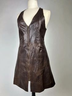 A Brown lambskin Mini-Dress Circa 1975 For Sale at 1stDibs Vintage Mini Dress For Fall, Retro Fitted Brown Mini Dress, 1970s Fitted Brown Dress, Fitted Brown 1970s Dress, Fitted Brown 1970s Style Dresses, 1970s Style Fitted Mini Dress, 1970s Fitted Mini Dress, Fitted 1970s Mini Dress, Vintage Fitted Brown Mini Dress