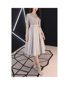 Buy modest grey midi hoco party dress with half sleeves at cheap price online. Free stable shipping and pro custom service since 2009. Elegant Gray Knee-length Midi Dress, Gray Formal Midi Dress, Gray Midi Length Dress For Formal Occasions, Gray Midi Length Formal Dress, Gray Short Sleeve Party Dress, Spring Prom Dress With Half Sleeves, Gray Short Sleeve Dress For Evening, Elegant Knee-length Gray Dress, Elegant Gray Knee-length Dress