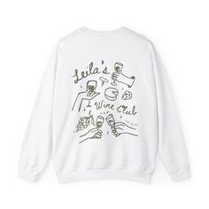 a white sweatshirt with the words julia's wine club printed on it and two hands holding glasses