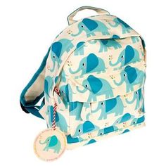 a blue and white backpack with an elephant print on the front, two small tags attached to it