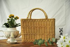 the summer bag is very stylish with a warm cute style ❤️❤️❤️ Trendy Rectangular Rattan Beach Bag, Chic Straw Bag For Spring Picnic, Chic Spring Straw Bag For Picnic, Casual Rectangular Straw Bag With Bamboo Handle, Casual Rectangular Beach Bag With Bamboo Handle, Casual Handmade Rattan Bag, Handmade Casual Rattan Bags, Trendy Woven Straw Bag For Picnic, Brown Rectangular Straw Bag For Picnic