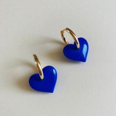 The earrings are made of polymer clay, they are ultra light on the ear, on a surgical steel support, nickel-free stud earrings with a silicone stopper. Will not cause irritation, your lobes will thank you! the heart measures 1.5cm in diameter. All buckles are designed and made by hand in France, they are unique and may vary slightly in color and shape. Polymer clay is a slightly flexible material. The buckle is covered with a light layer of resin so that it is more robust and shiny. The earrings Blue Huggie Single Earring, Blue Huggie Earrings For Everyday, Cute Blue Jewelry With Heart Charm, Trendy Blue Heart Earrings For Gift, Blue Heart Charm Earrings For Valentine's Day, Blue Heart-shaped Earrings For Valentine's Day, Trendy Blue Jewelry With Heart Charm, Cute Blue Earrings For Valentine's Day, Blue Hypoallergenic Hoop Earrings As Gift