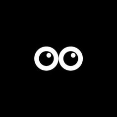 an eyeball is shown in the middle of a black background with white letters on it