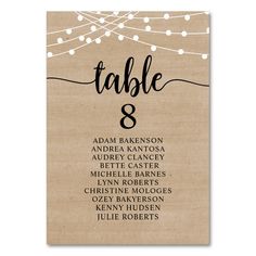 a table card with the names of different types of people and numbers in black ink