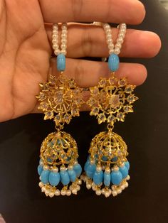 Traditional Hyderabadi Jhumkas with Saharas, gold plated on silver. Gemstones are faux Total length approximately 3.5 inches Gold Plated Stone Work Jhumkas For Celebration, Gold Plated Stone Work Jhumkas For Festivals, Gold-plated Stone Work Jhumkas For Celebrations, Gold Plated Jhumkas With Stone Work For Celebration, Festive Gold Kundan Necklace With Dangling Beads, Kundan Jhumkas With Dangling Beads For Wedding, Gold Chandbalis With Dangling Beads For Wedding, Traditional Gold Jhumkas With Dangling Beads, Wedding Kundan Jhumkas With Dangling Beads