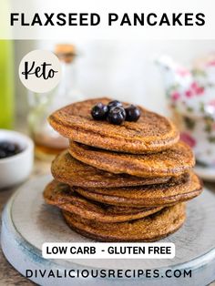 a stack of pancakes with blueberries on top and the words low carb gluten free