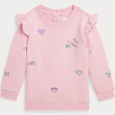 This Lightweight Sweatshirt Is Extra Cute Thanks To Ruffles At The Shoulders And An Embroidered Motif Of Hearts And Flowers. Its Cotton-Blend Fleece Is Washed And Peached For Ultimate Comfort. 60% Cotton, 40% Polyester. Machine Washable. By Choosing Our Cotton Products, You’re Supporting Our Investment In The Better Cotton Mission To Help Cotton Communities Survive And Thrive, While Protecting And Restoring The Environment. This Product Is Sourced Via A System Of Mass Balance And Therefore May N Playful Long Sleeve Tops With Ruffles, Cute Sweatshirt For Spring Playwear, Spring Cotton Sweatshirt With Ruffles, Spring Cotton Ruffle Sweatshirt, Spring Cotton Ruffled Sweatshirt, Playful Embroidered Crew Neck Top, Cute Ralph Lauren Long Sleeve Top, Pink Ralph Lauren Cotton Tops, Ralph Lauren Long Sleeve Tops For Spring