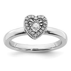 a heart shaped diamond ring on a white background