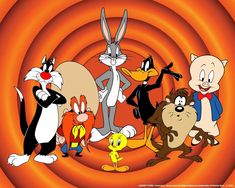 cartoon characters are standing together in an orange spiral pattern, with one cat looking at the camera