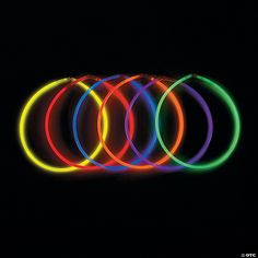 neon glow bracelets on a black background