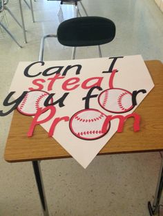 a sign that says can't steal you for prom on a desk in a classroom