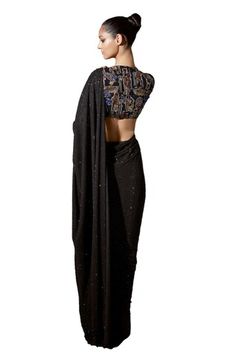 Black net pre-stitched saree with crystal embellishments. Comes with a silver blouse. - Aza Fashions Evening Draped Blouse Piece With Mirror Work, Fitted Black Draped Saree, Fitted Embellished Draped Blouse, Embellished Fitted Draped Blouse, Fitted Draped Blouse Piece With Sequins, Fitted Draped Sequin Blouse Piece, Embellished Semi-stitched Draped Blouse Piece, Embellished Draped Semi-stitched Blouse Piece, Evening Blouse With Sequins In Traditional Drape