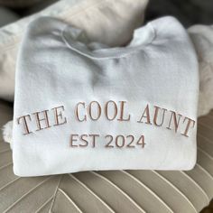 Embroidered Custom The Cool Aunt Sweatshirt, Personalized Aunt Hoodie With Est Custom Date, Cool Aunt Outfit, New Aunt Crewneck, Auntie Apparel White Crew Neck Hoodie With Letter Embroidery, White Hoodie With Embroidered Text For Fall, White Embroidered Hoodie For Fall, White Long Sleeve Hoodie With Embroidered Text, Winter White Sweatshirt With Embroidered Text, White Embroidered Hoodie Crew Neck, White Hoodie With Embroidered Text For Winter, White Hooded Top With Custom Embroidery, White Embroidered Text Hoodie Sweatshirt