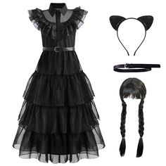 a black dress and headband with cat ears on the top, along with a pair of hair accessories